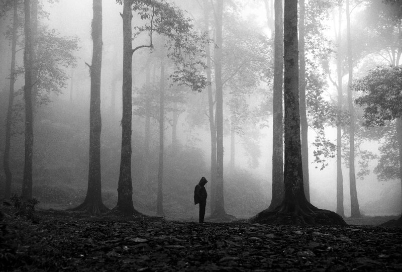 Person in Hooded Coat