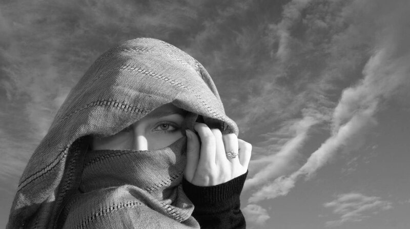 Person in Hooded Garment
