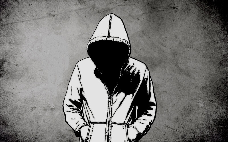 person in hooded jacket
