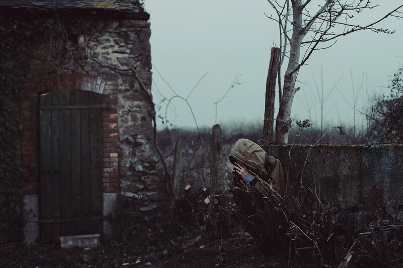 Person in Hooded Jacket — Gray, Somber, Winter