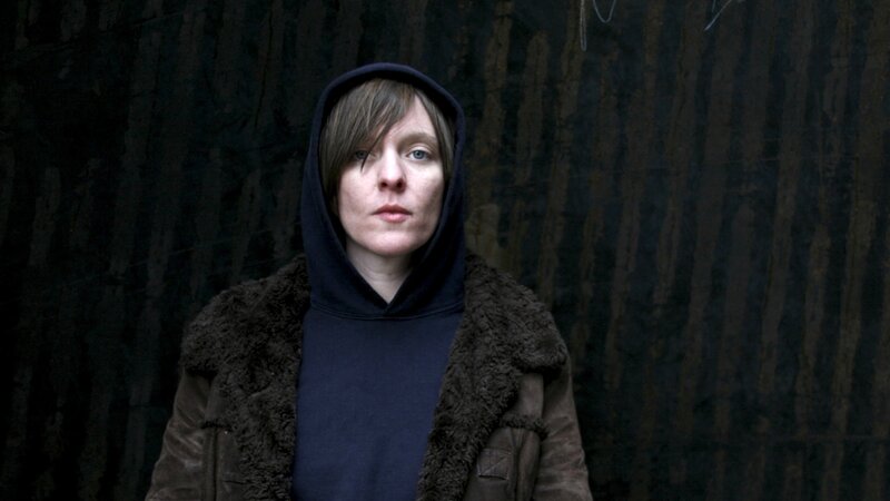person in hooded jacket