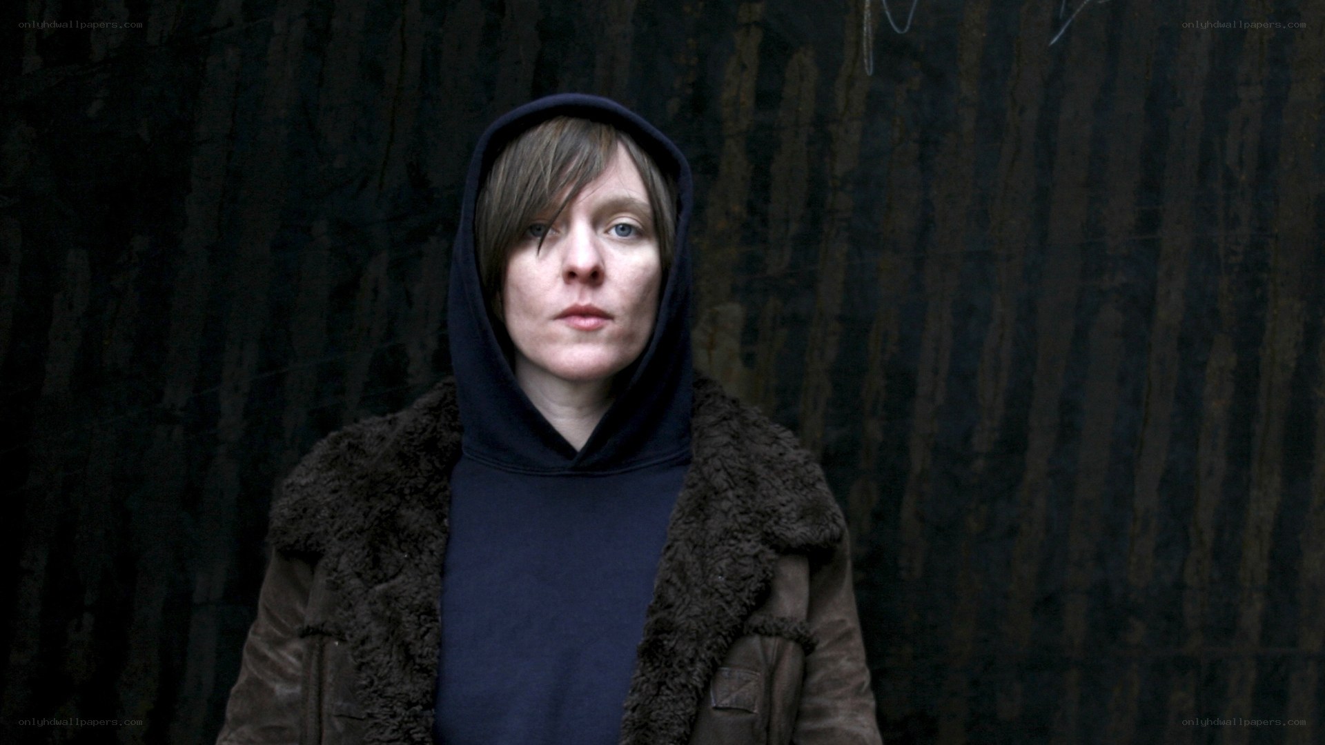 person in hooded jacket