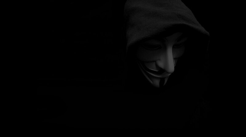 person in hooded mask