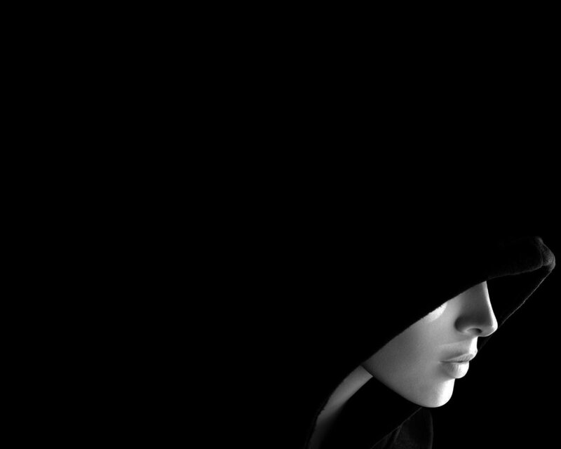person in hooded silhouette