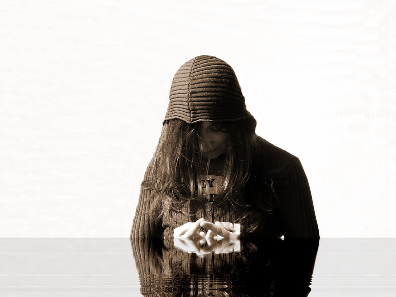 Person in Hooded Sweater — Brown