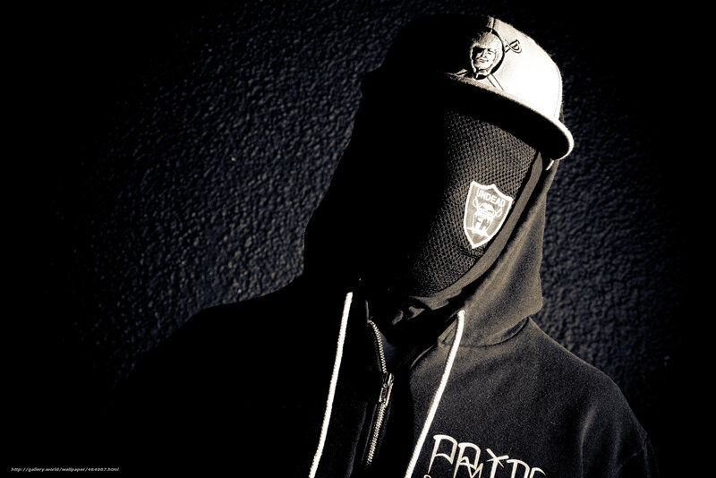 person in hoodie and cap
