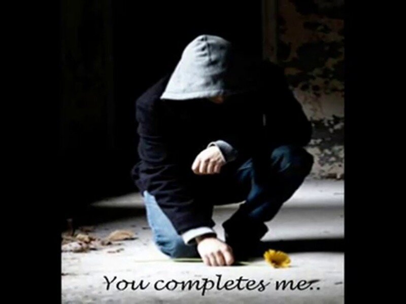 Person in Hoodie Crouching