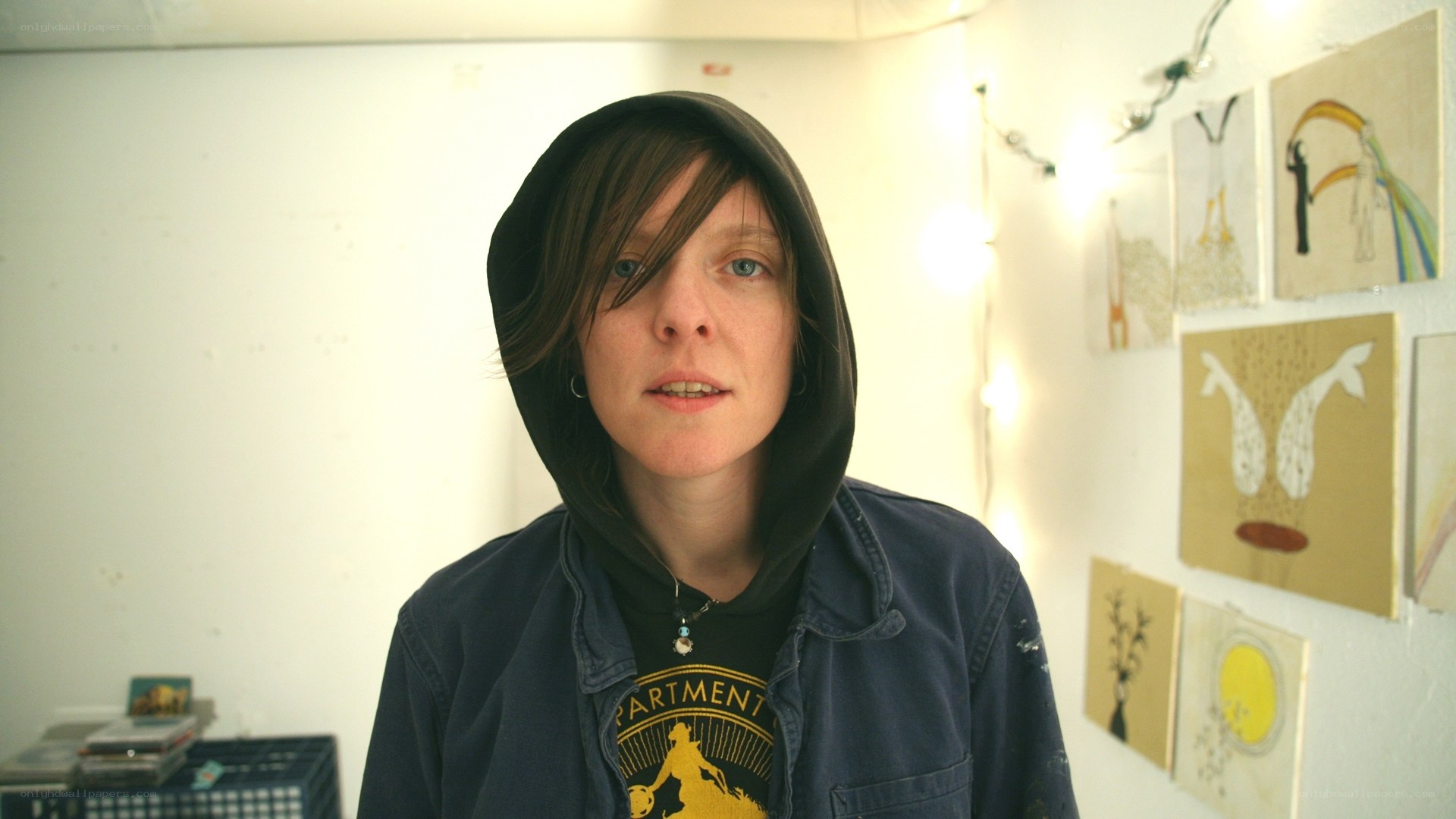 person in hoodie with artwork