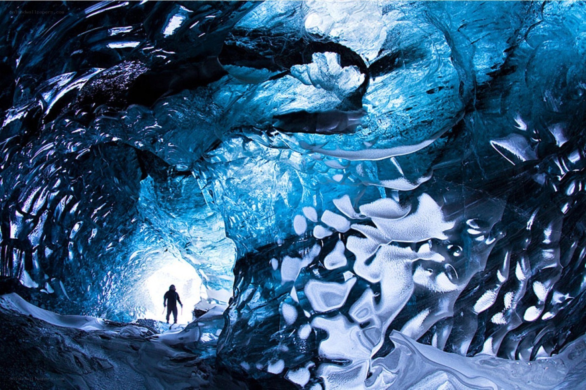 person in ice cave