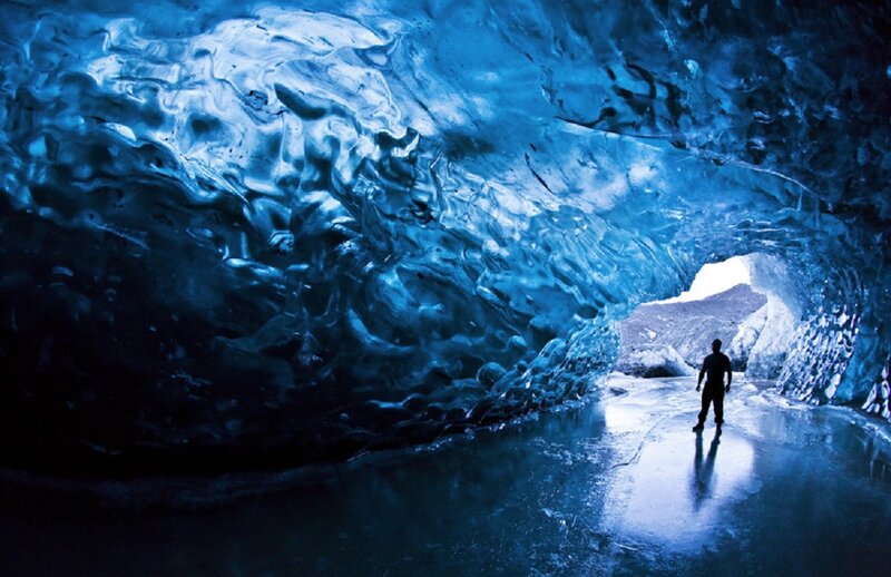 Person in Ice Cave — Blue, Dramatic, Photograph, Light
