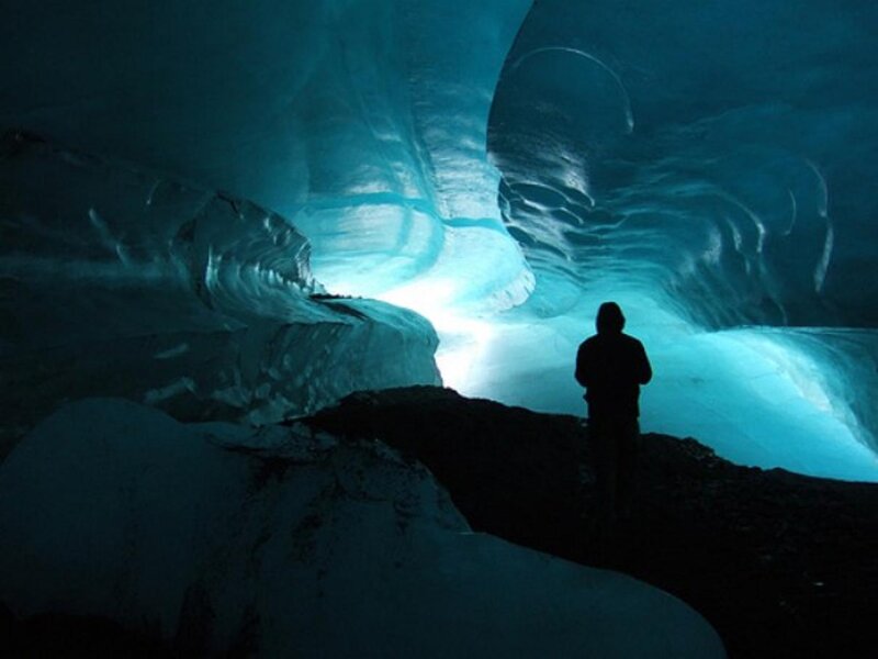 Person in Ice Cave — Blue, Dramatic