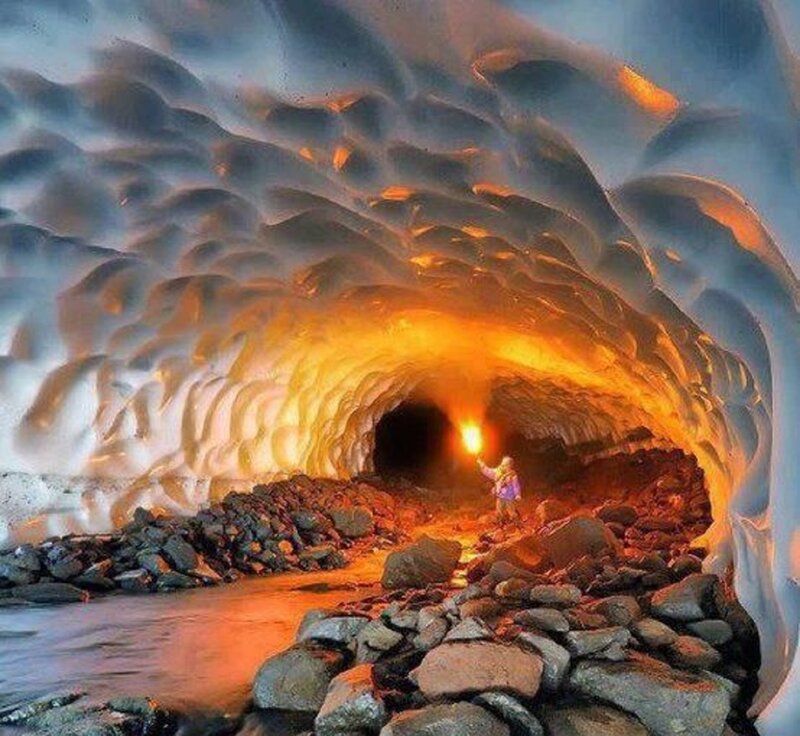 Person in Ice Cave — Orange