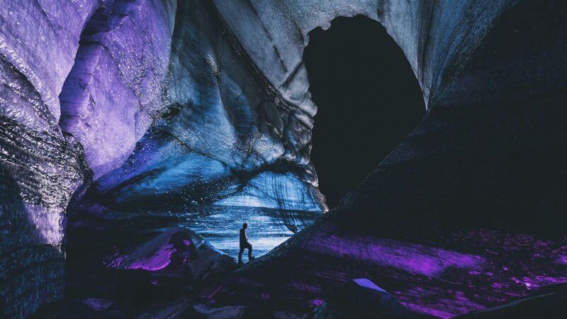 Person in Ice Cave — Purple