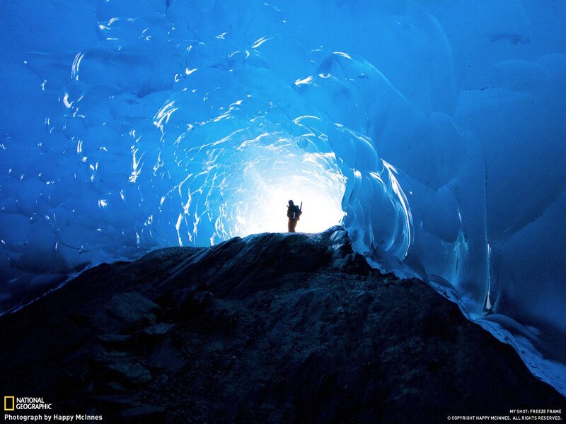 person in ice cave