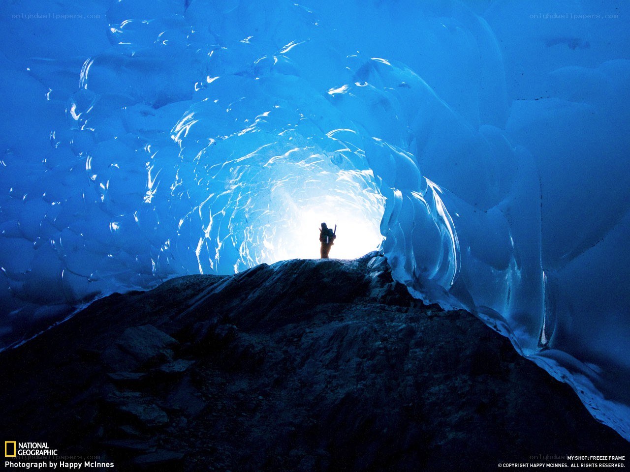person in ice cave