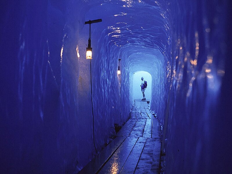Person in Ice Tunnel — Blue