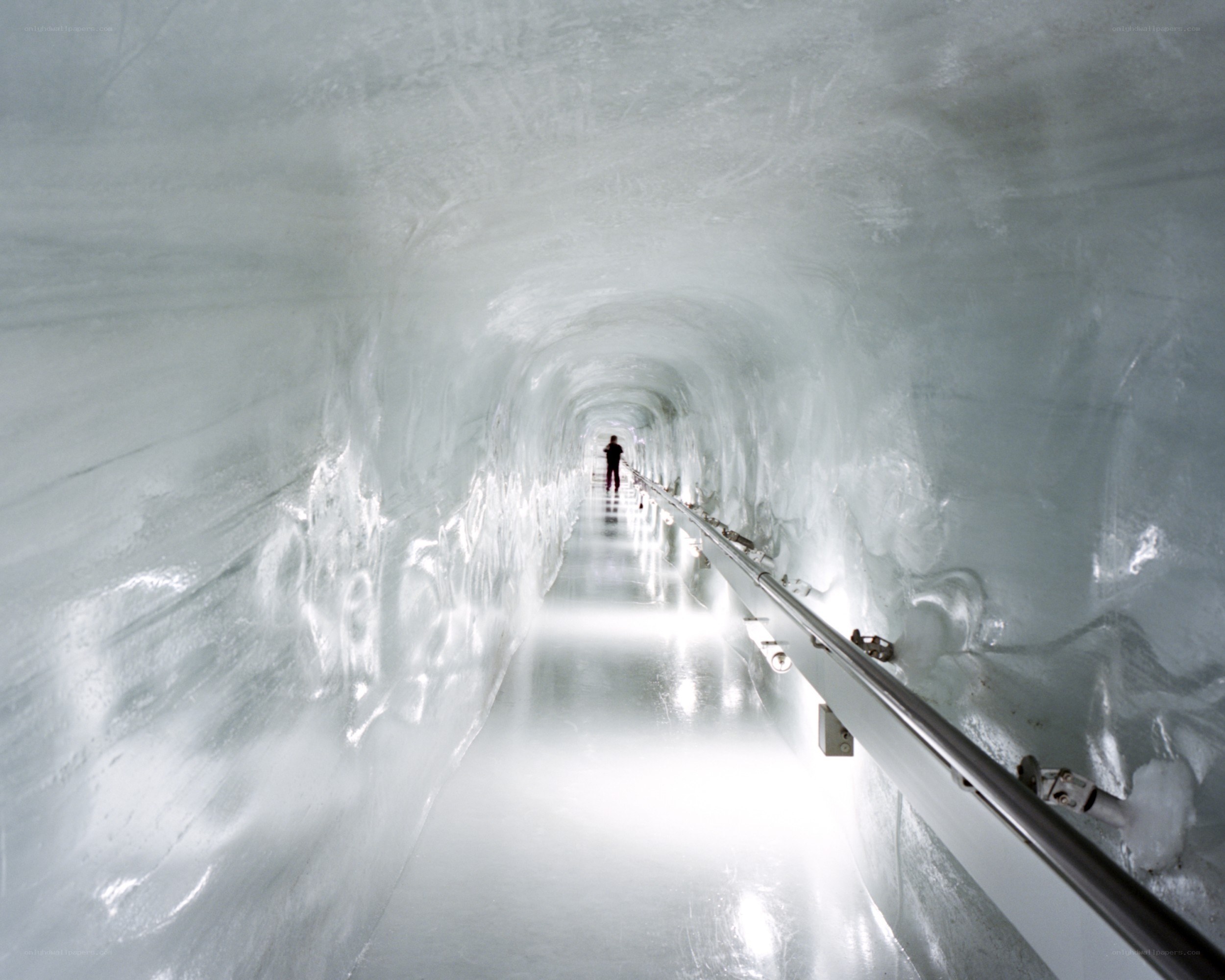 person in ice tunnel