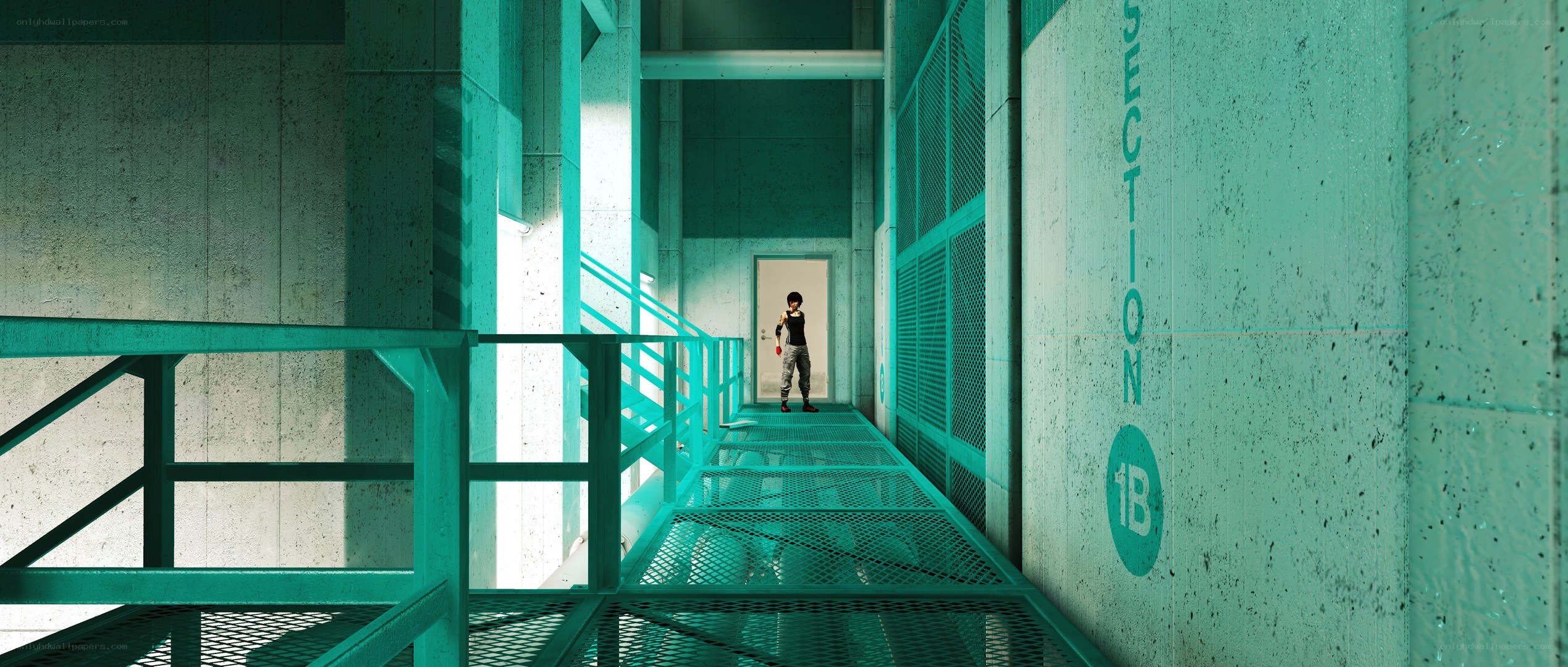 person in industrial corridor