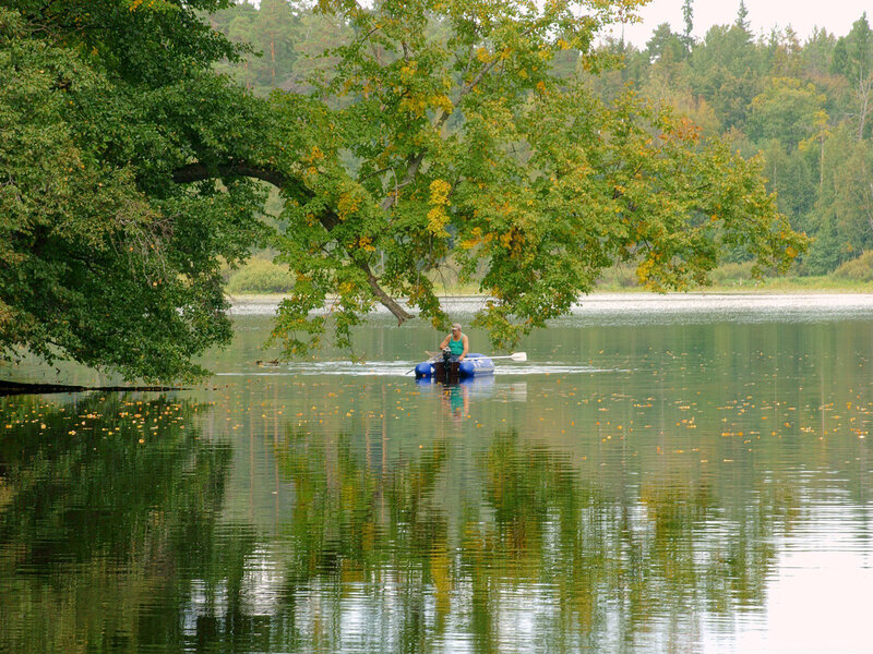 Person in Inflatable Boat — Green