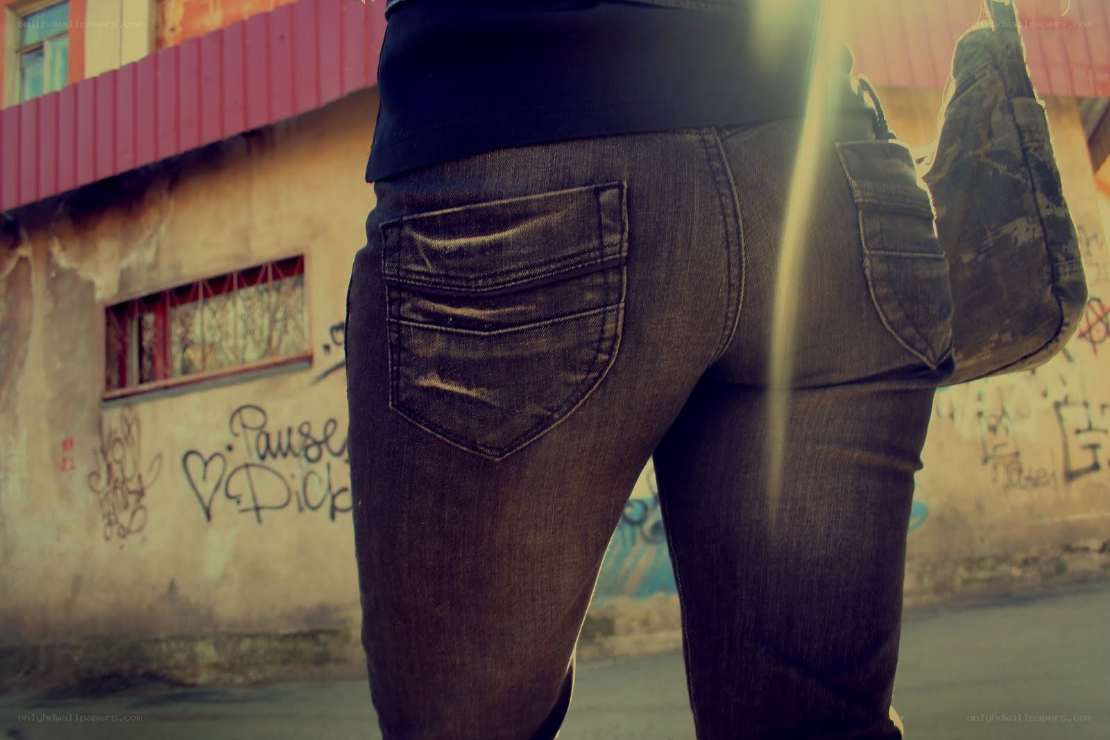 person in jeans from behind
