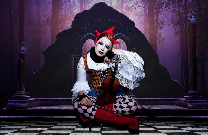 Person in Jester Costume — Purple