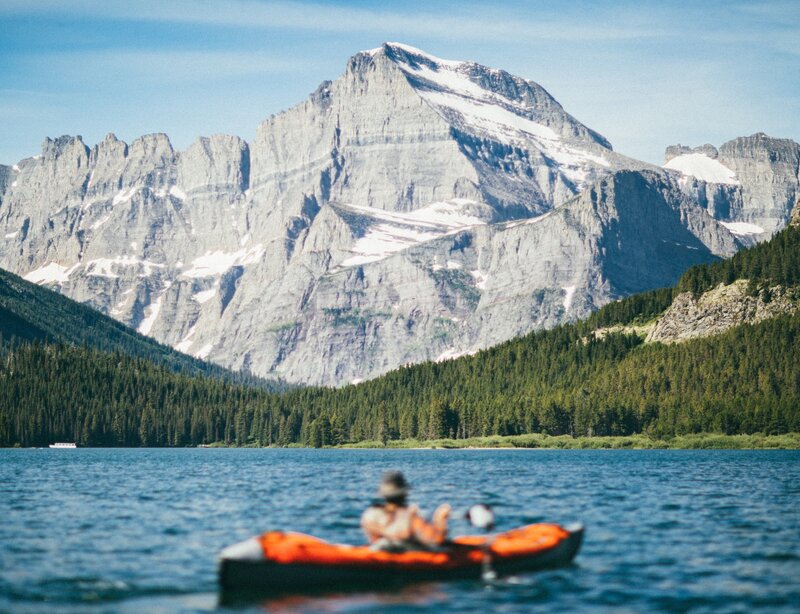 Person in Kayak — Blue, Serene, Afternoon, Photograph