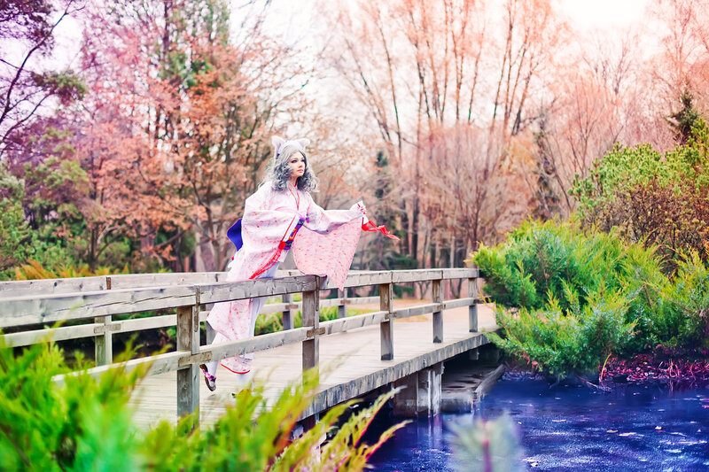 Person in Kimono on Bridge