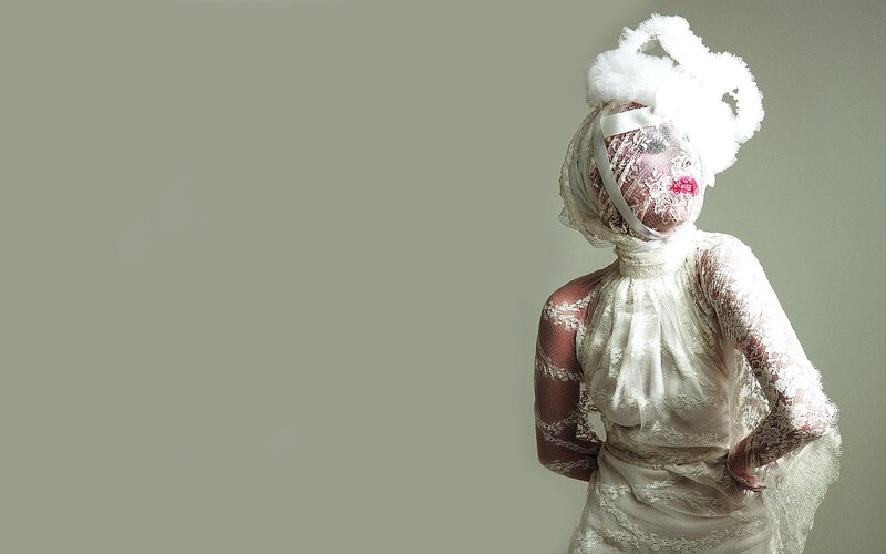 Person in Lace Costume