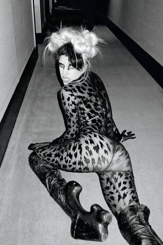 person in leopard print bodysuit