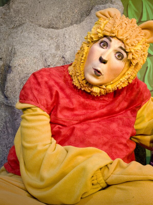 person in lion costume