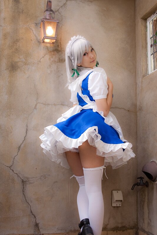 Person in Maid Costume — Blue, Playful, Photograph, Wall