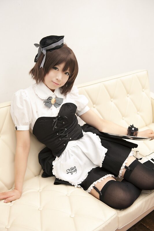 Person in Maid Outfit — White, Calm, Photograph