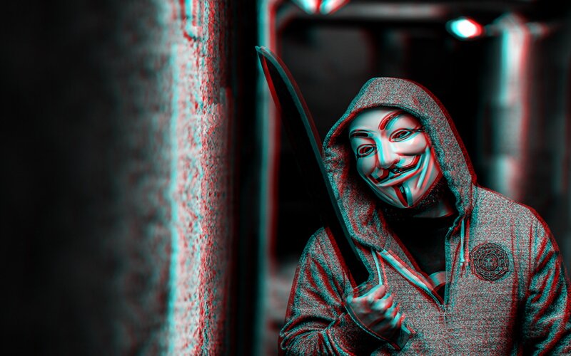 Person in Mask Holding Knife