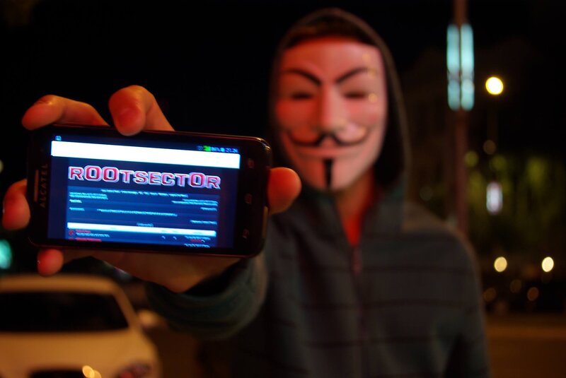person in mask holding phone