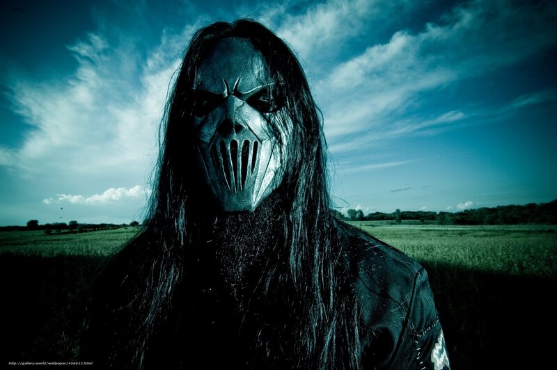 person in mask in field