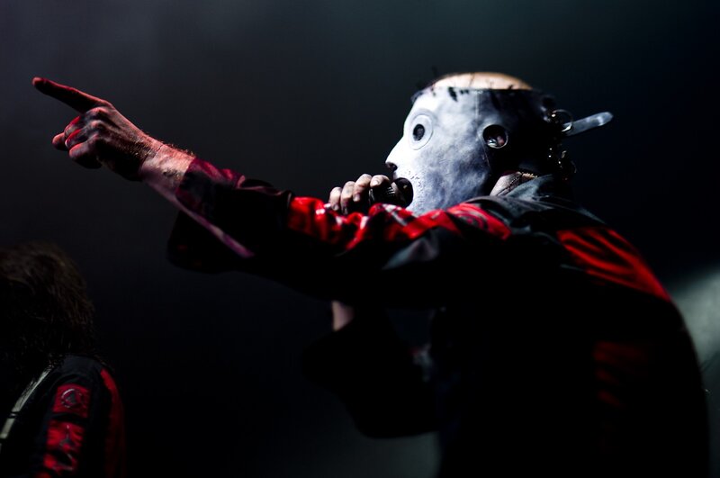 Person in Mask on Stage