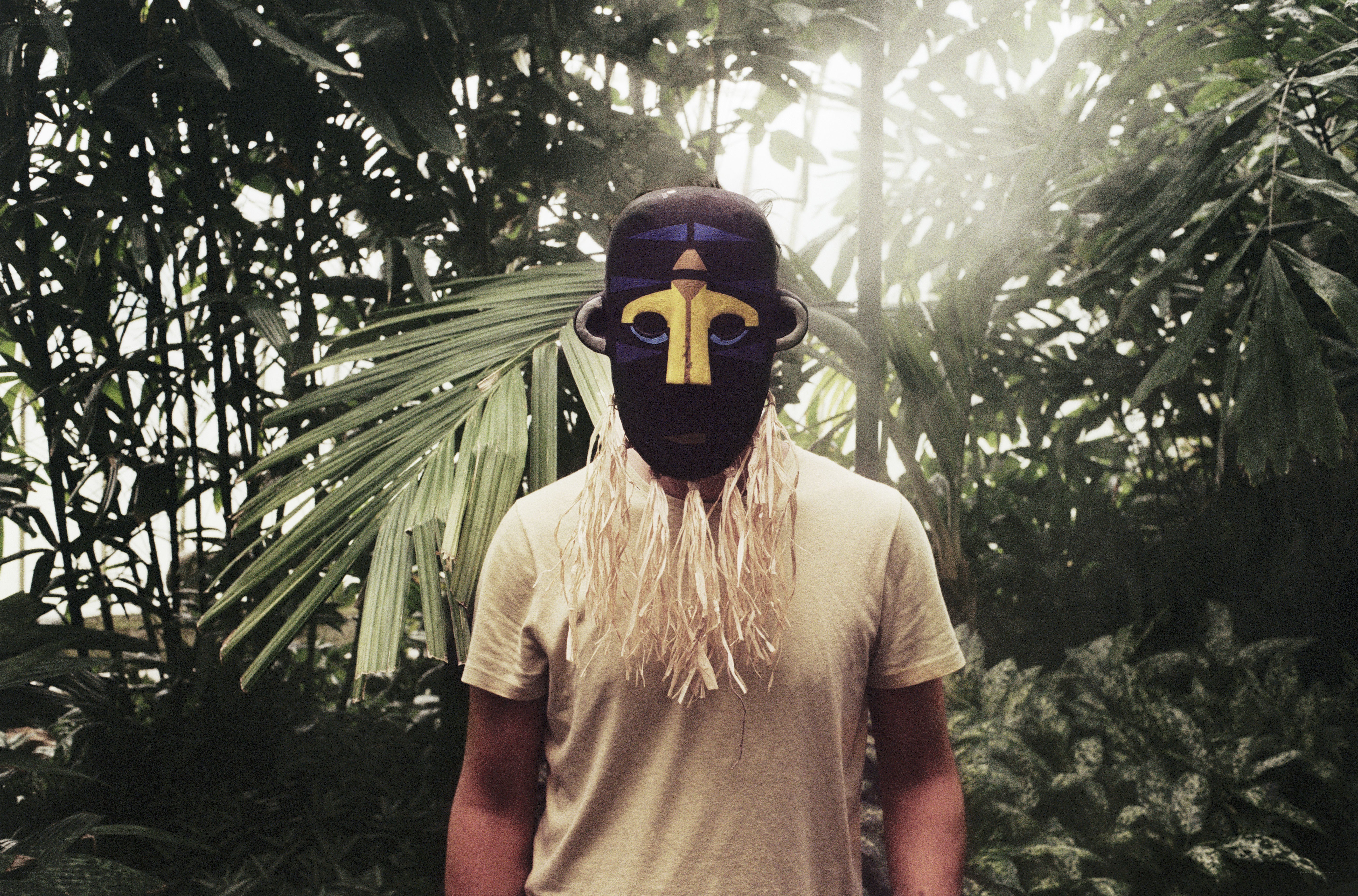 person in mask with straw beard
