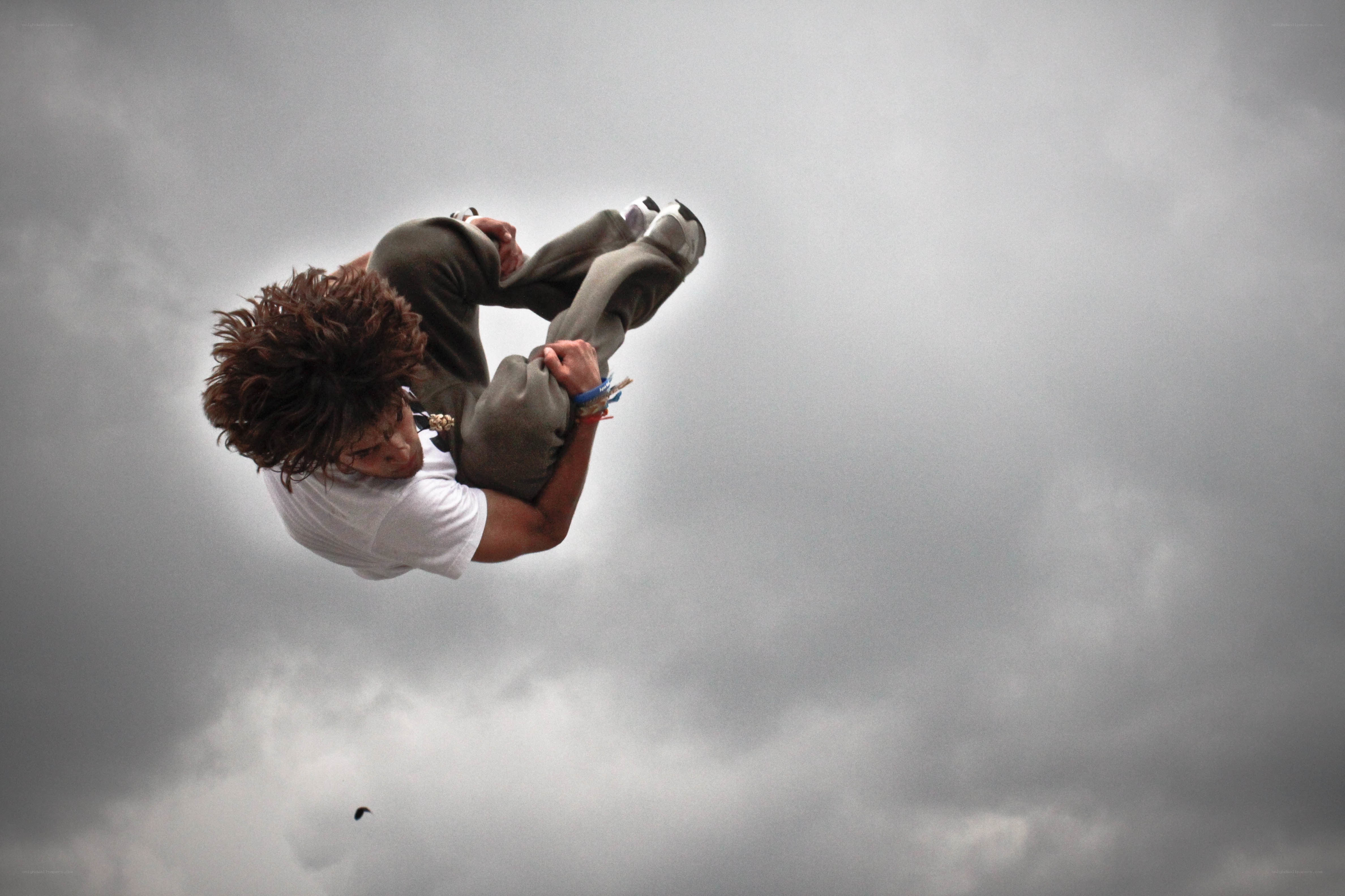 person in mid-air jump