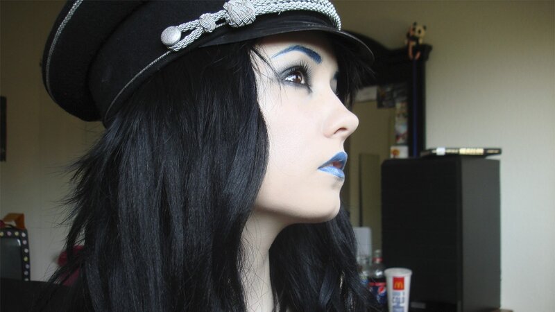 person in military-style hat