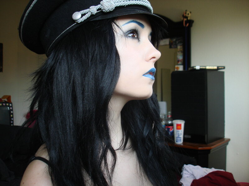 person in military-style hat