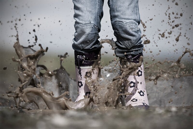 Person in Muddy Boots
