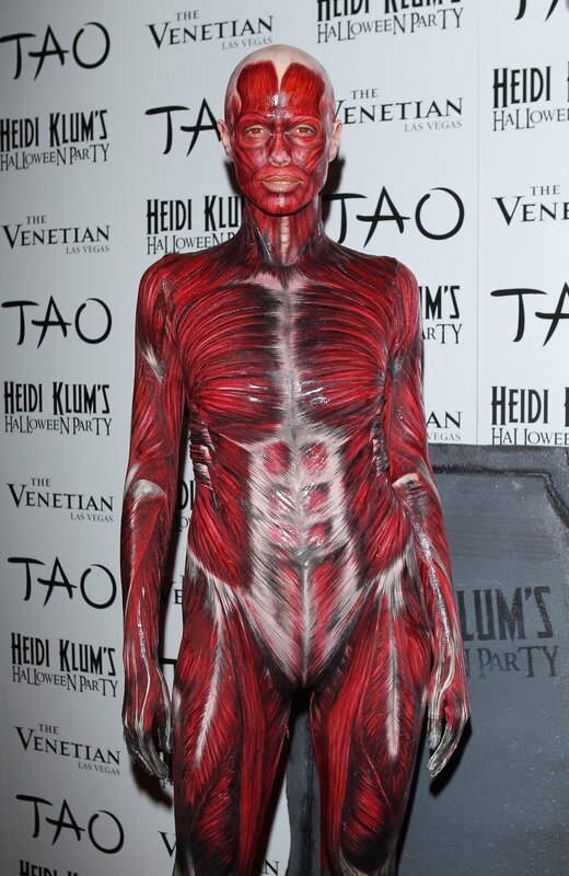 person in muscle costume
