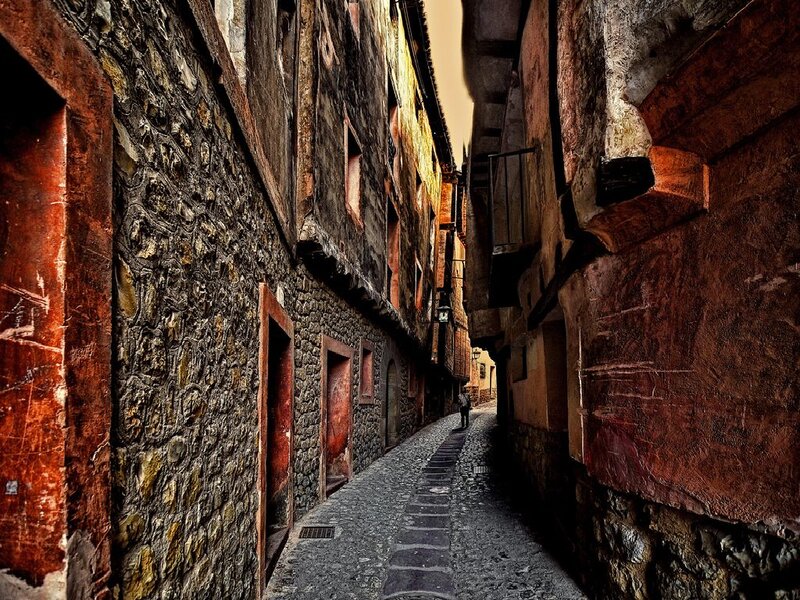 Person in Narrow Alley