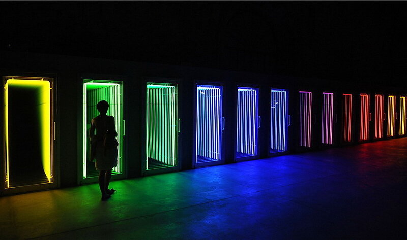 person in neon art installation