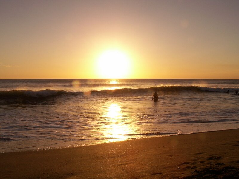 Person in Ocean at Sunset — Gold