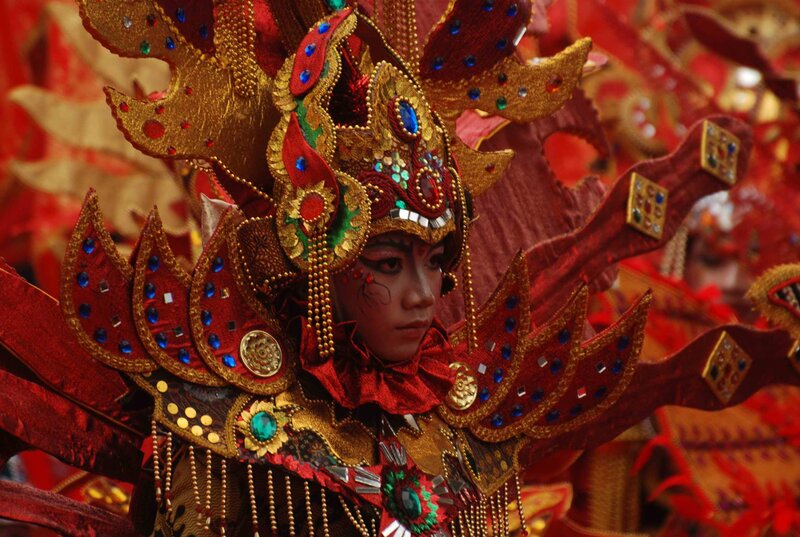 Person in Ornate Costume — Red