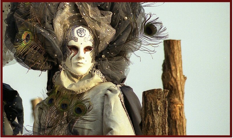 person in ornate mask and costume
