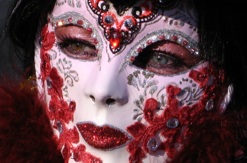 Person in Ornate Mask — Red