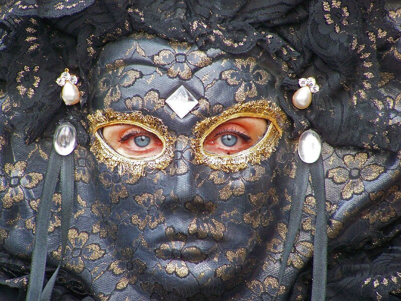 person in ornate mask