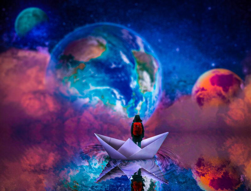 Person in Paper Boat